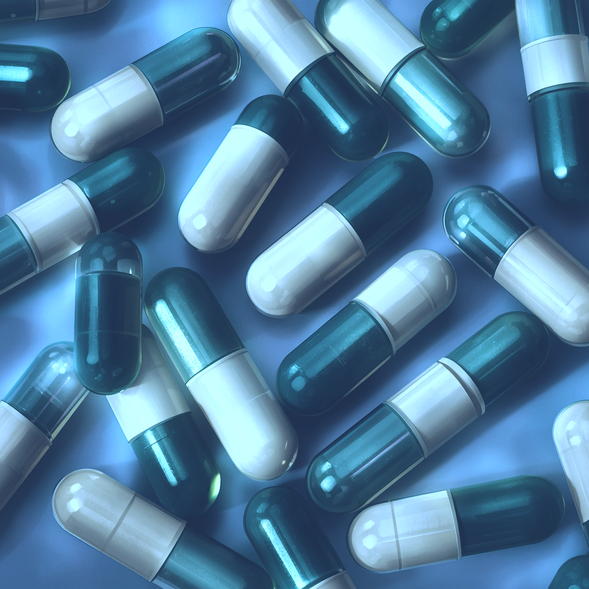 Prozac medication capsules, green and cream colored pharmaceutical capsules with Prozac branding